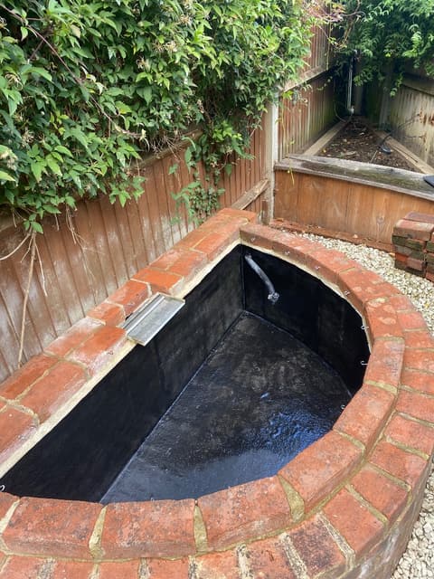 The same Ashford pond after, emptied, cleaned and freshly lined