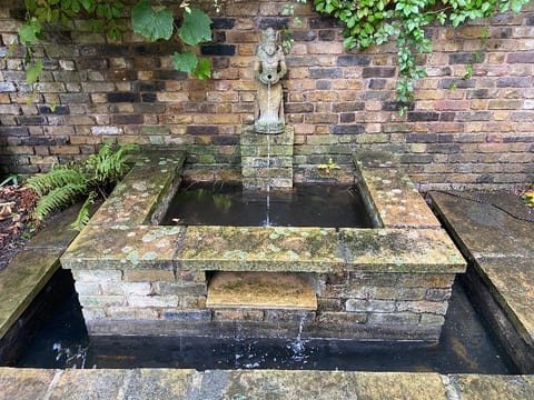 The same Blackheath pond after, clear water and the statue fountain running again